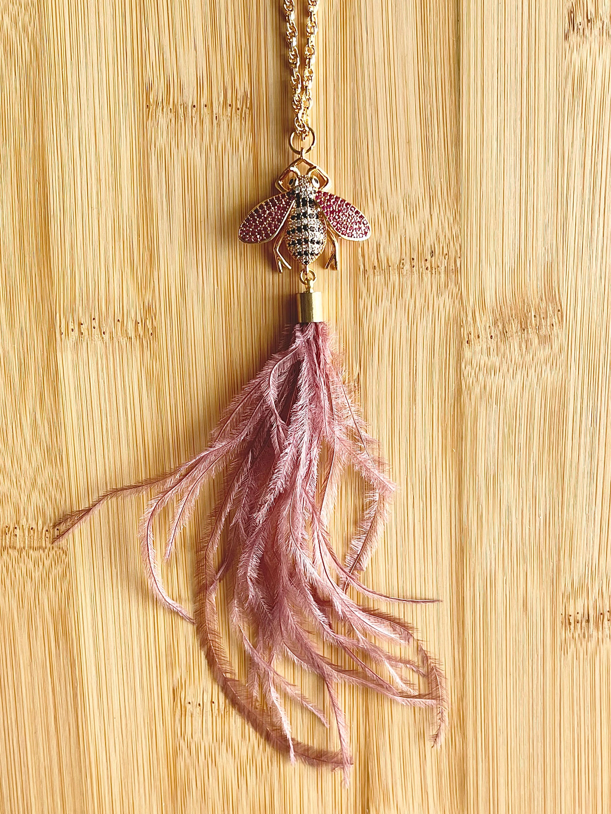Mauve ostrich feather and crystal bee pendant necklace