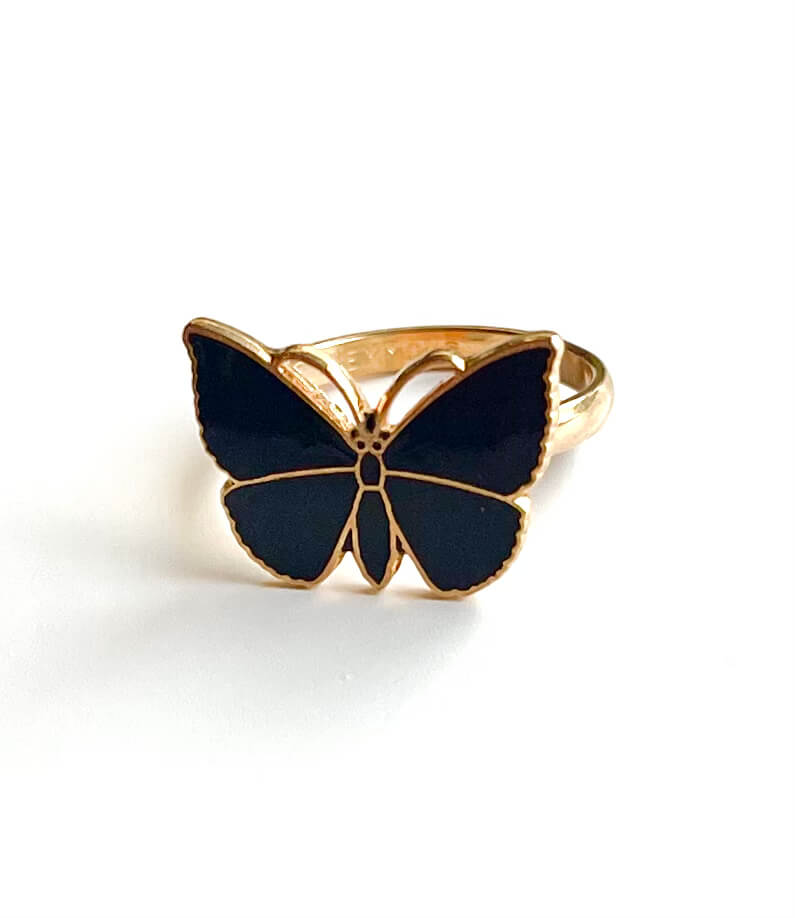 Yellow brass butterfly ring with black enamel on the wings and body.